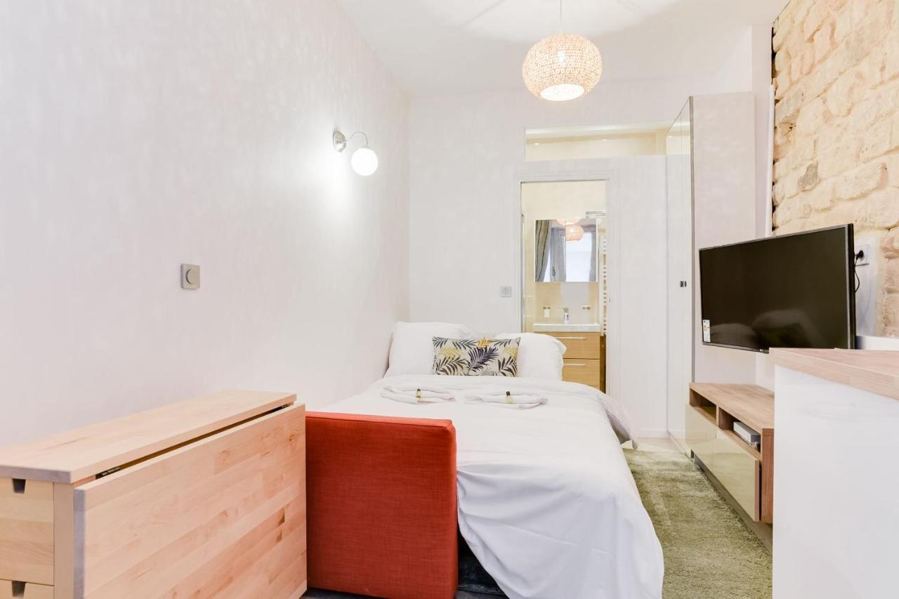Studio Near Le Moulin Rouge And Montmartre ปารีส ภายนอก รูปภาพ